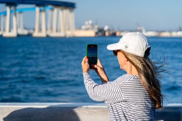 A Woman Holding Out and Taking an Image